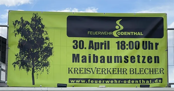 Ankündigung auf grünem Plakat